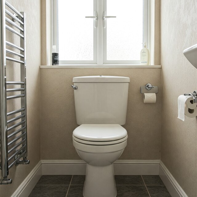 Image of a modern toilet in Shadwell with potential blocked drain issues, requiring professional unblocking services