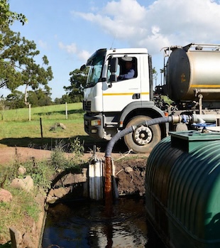 tanker emptying sewerage in rural leeds